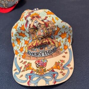 Mary Engelbreit Illustrated Crown & Ribbon Baseball Cap in Light Blue and Orange